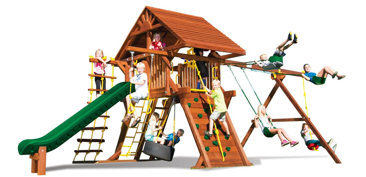 Studio photo of the Rainbow Castle Pkg II playset, showing the wood roof, rock wall, scoop slide, tire swing and four-position swing beam