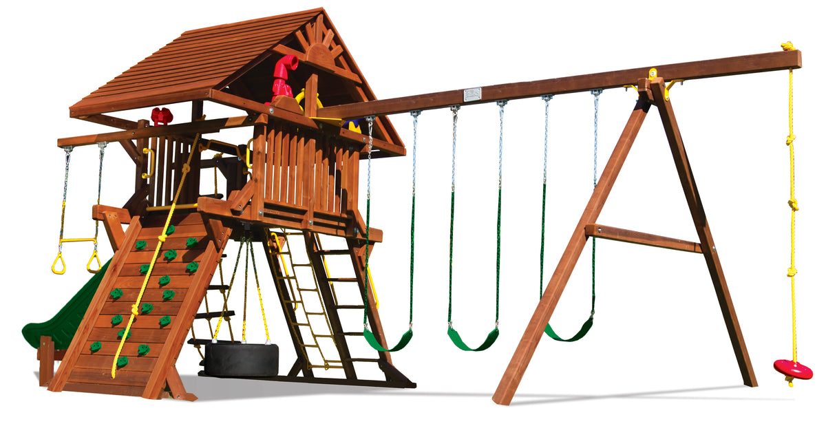 Studio photo of the Rainbow Castle Pkg II from the slide side, showing the scoop slide, deck and swing beam